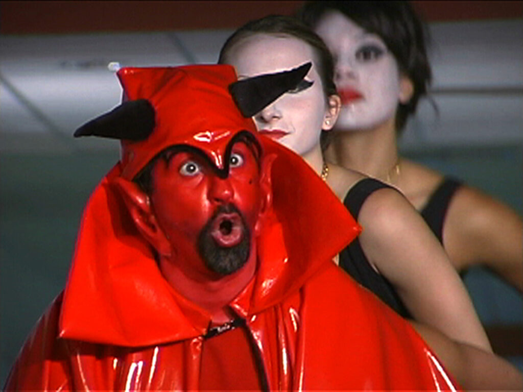 In the image a character dressed in red.